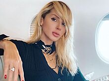 Светлана Лобода устроила пляжную фотосессию в прозрачном халате невесты