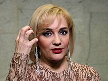 Буланова выступила на похоронах Анчукова и расплакалась