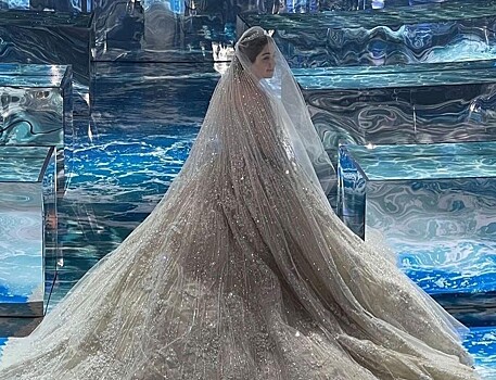 Платье с километровым шлейфом и лезгинка Лепса: как прошла свадьба дочери Гуцериева