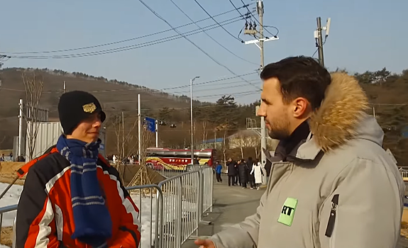 Американец объяснил, зачем принес российский флаг на Олимпиаду