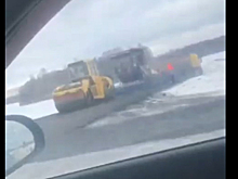 Несмотря на запреты властей под Новосибирском укладывали асфальт в снег