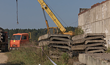 Заброшенную ферму снесли в Московской области по программе ликвидации аварийных и недостроенных объектов