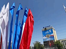 Краснодар преображается к Дню России: баннеры и флаги на городском транспорте