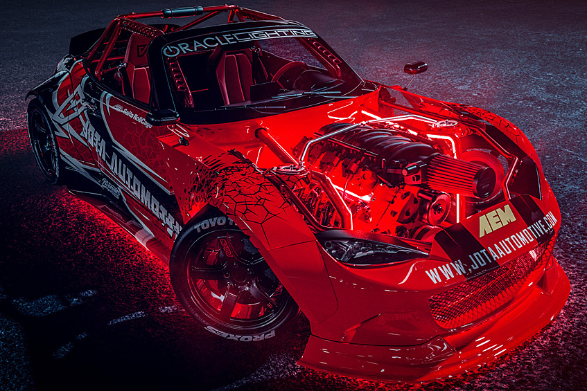 Mazda MXV8.  Автор пишет: «Кастомный широкий кузов, мотор V8 LS, радиатор сзади, каркас и достаточное количество светодиодов, чтобы вас ослепить».