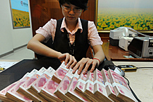 Россия поднялась на третье место по объему расчетов в юанях