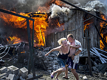 Лауреаты международной премии фотожурналистики World Press Photo