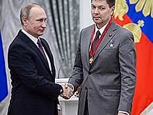 Владимир Путин вручил самарскому послу ЧМ-2018 Олегу Кононенко государственную награду