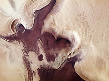 Орбитальный зонд разбил надежды на жидкое озеро подо льдом на Марсе