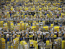 Цена акций Amazon.com впервые превысила $1 тыс.