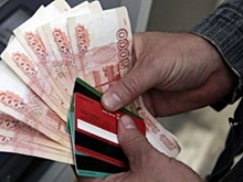 Снять наличные, не отходя от кассы. Бизнес задумался о новом сервисе