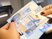 В банкоматах появились купюры с изображением Владивостока и Крыма