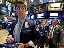 Биржи США снизились на слабой статистике и прогнозах МВФ