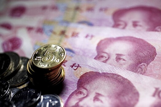 Юань превысил отметку 7 за доллар впервые с августа