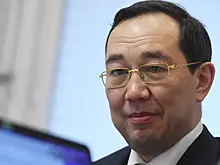 Глава Якутии окунулся в крещенскую купель в минус 30