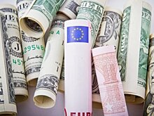 Центробанк повысил курсы доллара и евро на четверг