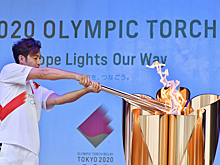 Олимпийский огонь прибыл в Токио