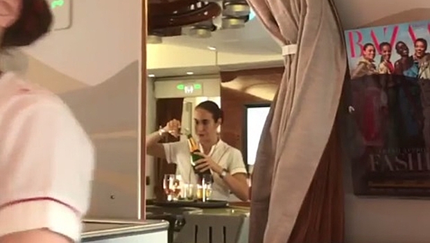 Emirates employees caught pouring champagne from used glasses back into bottles