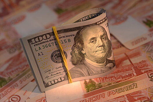 Курс доллара на открытии торгов снизился до 59,45 рубля