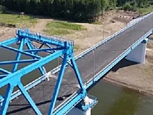 В Красноярском крае на Высокогорском мосту закончена укладка асфальта
