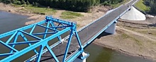 В Красноярском крае на Высокогорском мосту закончена укладка асфальта
