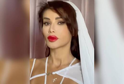 Айза снялась в свадебном платье после новостей о разводе Гуфа