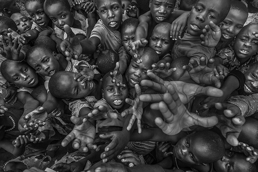 Второе место — «Дети Уганды». Автор фото: Я Куанг. Местоположение: деревня на озере Эдуард, Уганда.  