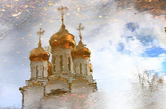 Папа русский под дождем