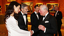 Джордж и Амаль Клуни и Бенедикт Камбербэтч на приеме в Букингемском дворце