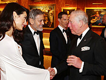 Джордж и Амаль Клуни и Бенедикт Камбербэтч на приеме в Букингемском дворце