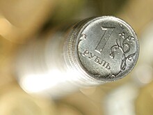 Рубль растет к доллару