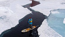 Россиянин первым в истории покорил Северный полюс на сапсерфе