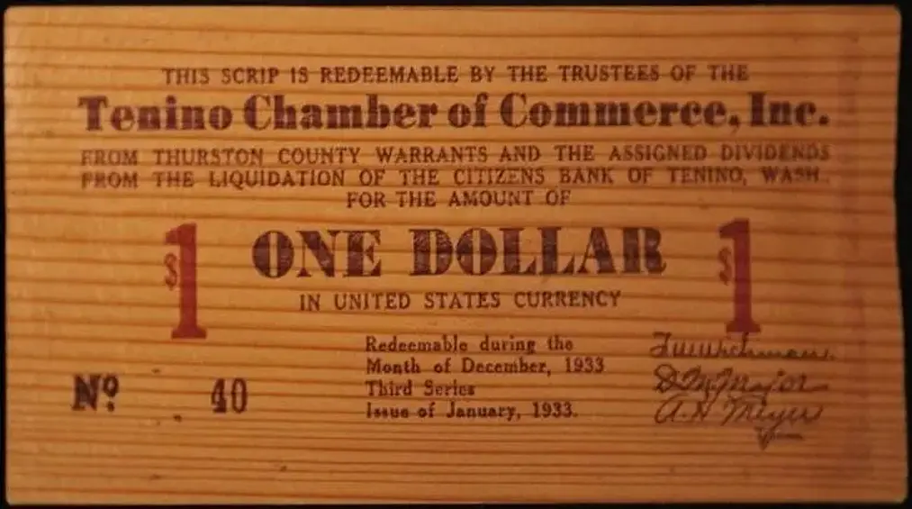 Один деревянный доллар. Такие использовались в городе Тенино, штат Вашингтон, США, во время Великой депрессии 1930‑х годов.