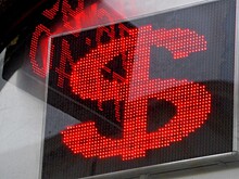 Доллар завершил неделю ростом