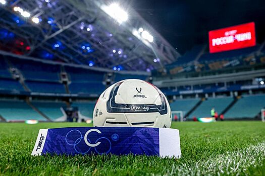 Фото: капитанская повязка сборной России на игру с Чили, посвящённая Олимпиаде в Сочи