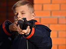 Подросток с ружьем