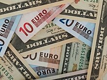 Официальный курс доллара на вторник снизился до 62,26 рубля