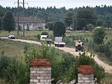 На месте крушения самолета с Пригожиным заметили грузовики и подъемный кран