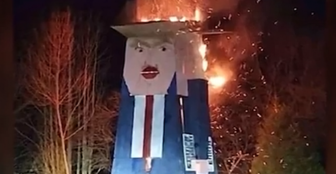 Деревянного Дональда Трампа сожгли в Словении