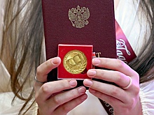 На обороте школьных медалей будет изображена раскрытая книга