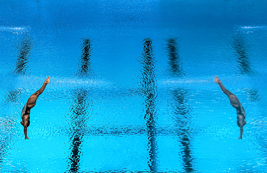 Энисли Гарсия Наварро (Куба) в финальных соревнованиях по прыжкам в воду с трамплина 3 метра среди женщин на Международном фестивале студенческого спорта в Екатеринбурге