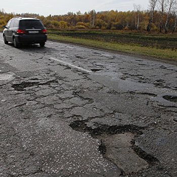 Новая дорога под Полтавой покрылась ямами спустя пару месяцев