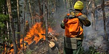 Якутия в огне: природные пожары подошли вплотную к селам и Светлинской ГЭС