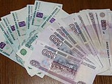 Рубль снижается к доллару и евро в рамках коррекции