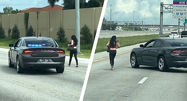 Две полицейские машины пытаются поймать идущую по шоссе девушку в США