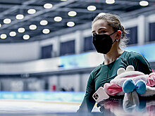 Олимпийская чемпионка Камила Валиева вернулась из Пекина в Москву