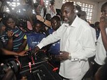 Президентом Либерии избран бывший футболист Джордж Веа