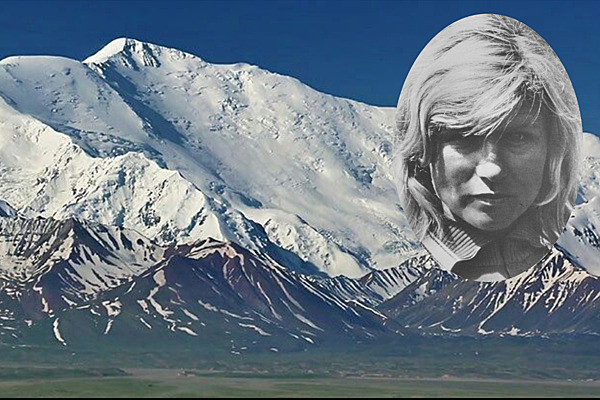 Әйел ер адамның есегіне саусағын тигізеді