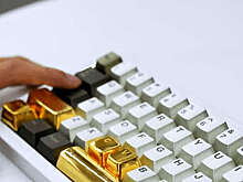 SCMP: в Китае сотрудники компании получили золотые кейкапы в качестве бонуса