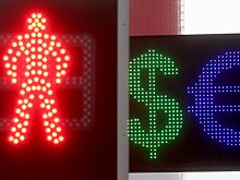 Рубль упал вслед за нефтью