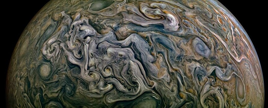 Прекрасный снимок отображает хаос и чудо Юпитера